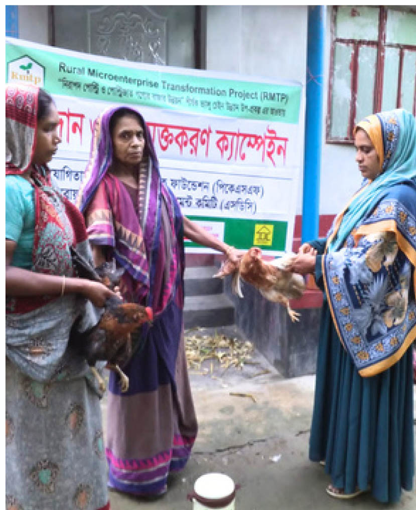 Women participating in poultry awareness and vaccination campaign